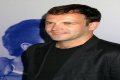Jonny Lee Miller flashes ink for Ellen charity